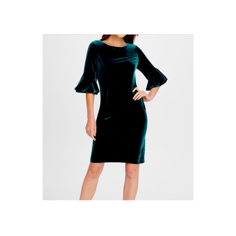 Emerald green velvet dress.